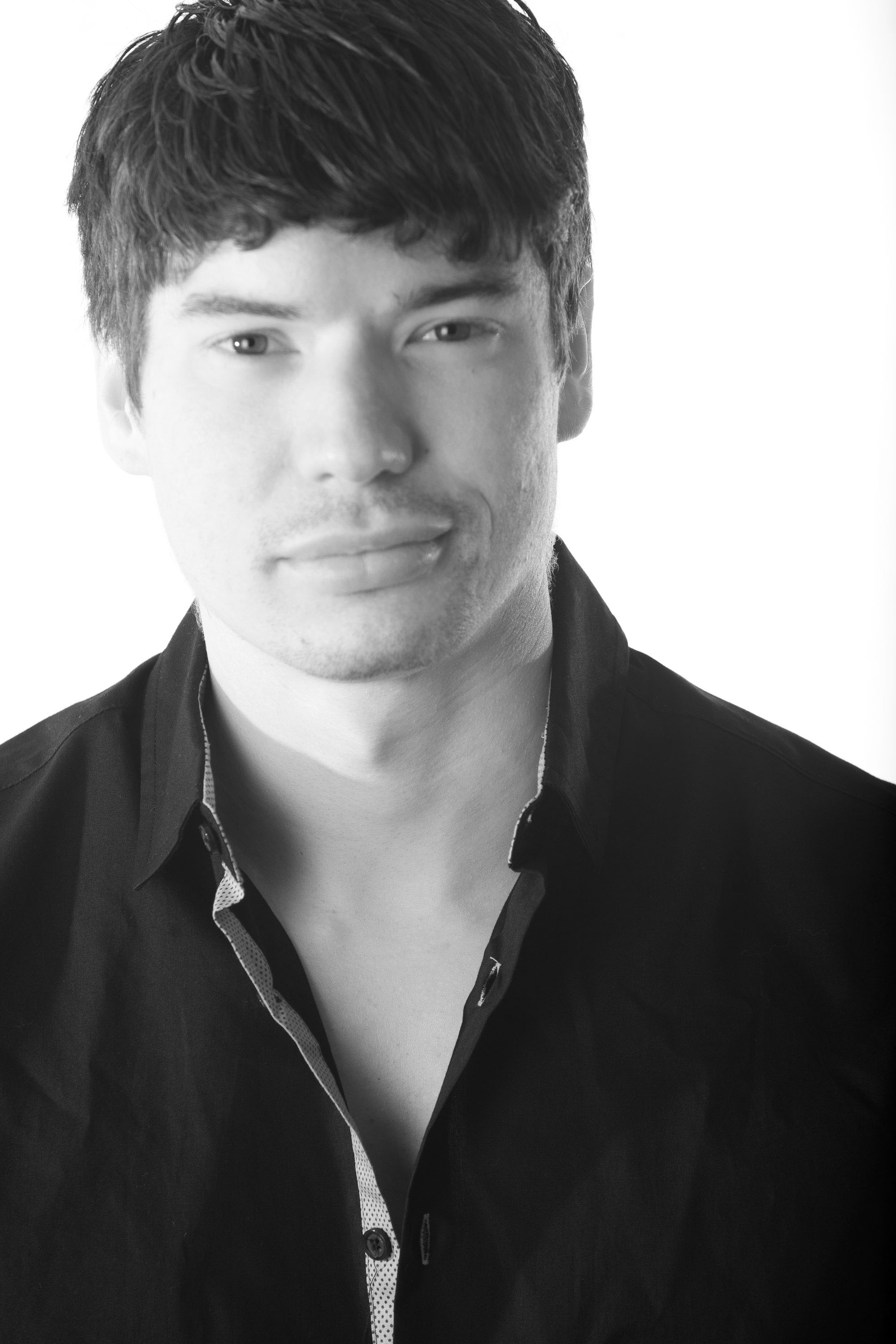 Striking black-and-white branding portrait for boxing coach Kevin Fagel