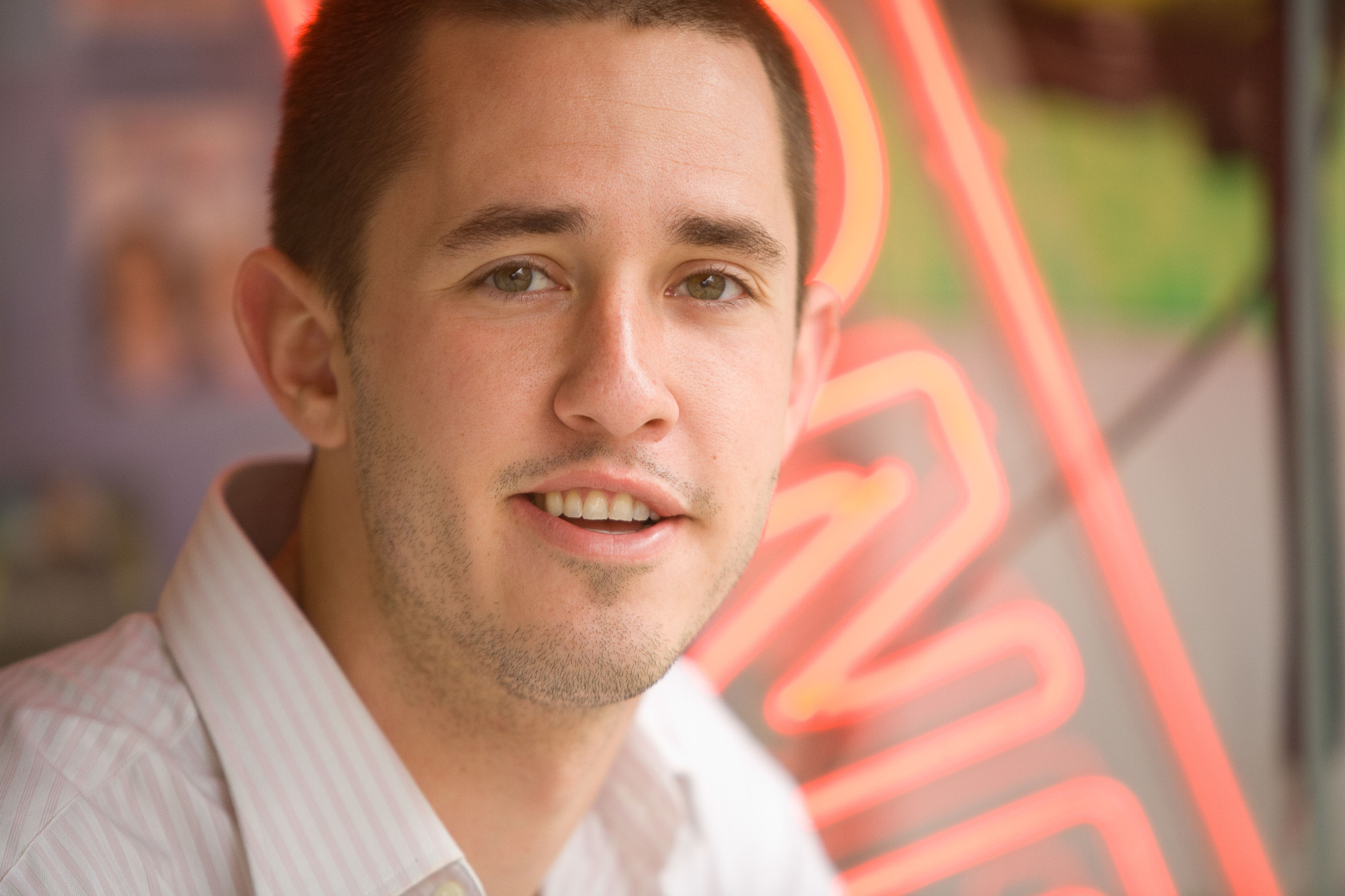 Neon-lit online dating portrait for a good looking gentleman