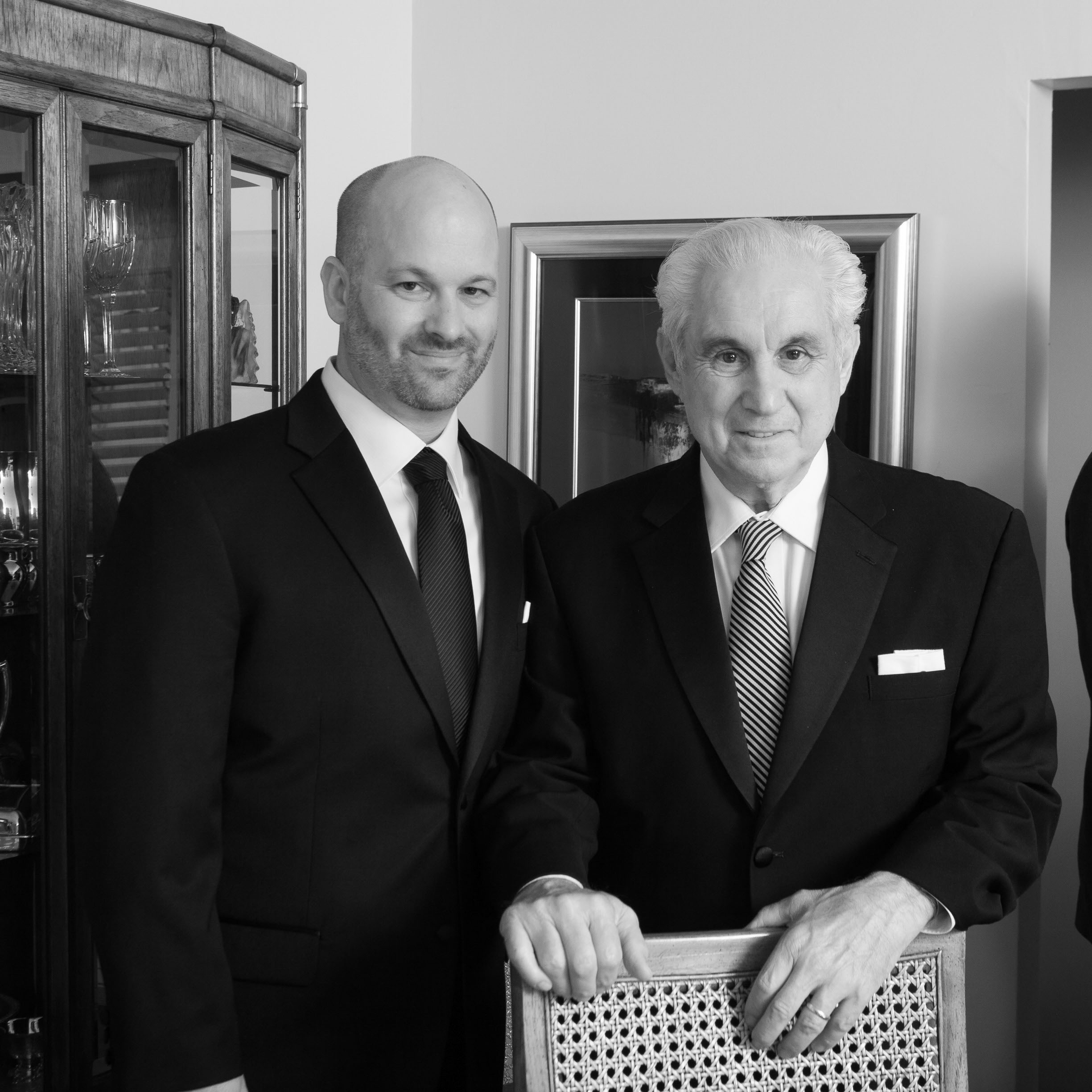 A lovely black and white portrait of the groom with his dad at the Garden Court Hotel in Palo Alto