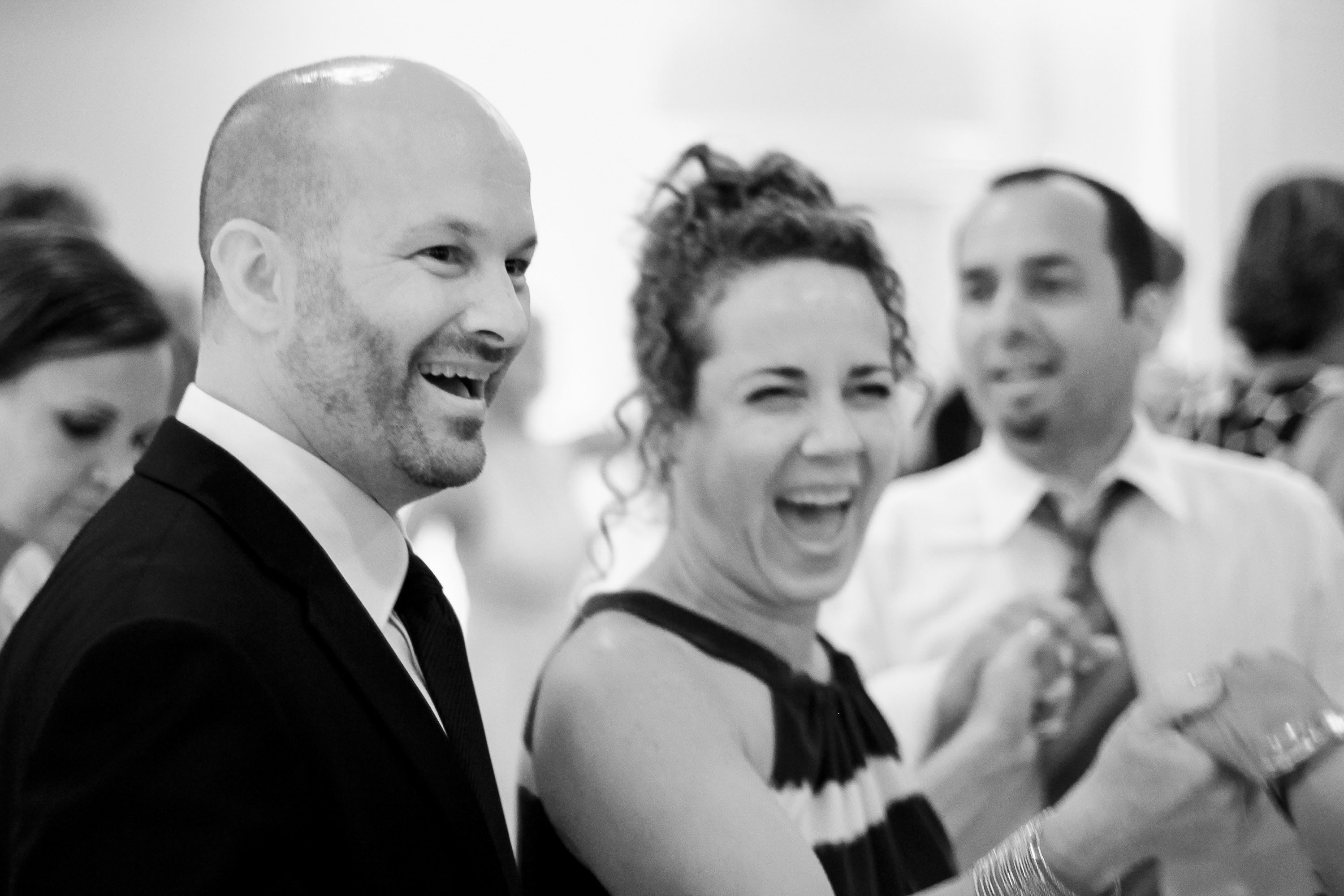 The groom dancing with his guests at the Garden Court Hotel in Palo Alto