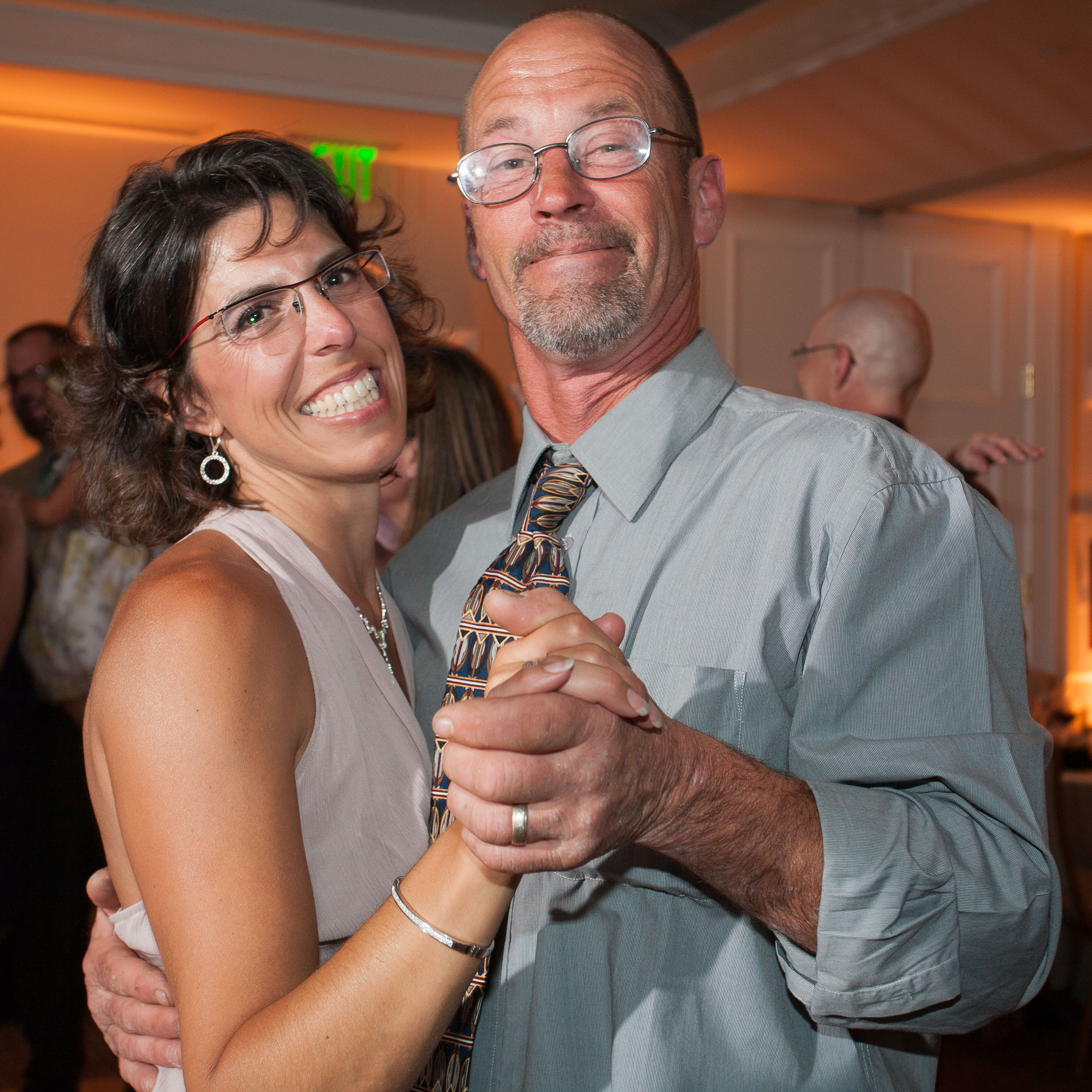 Guests smile as they dance at the Garden Court Hotel in Palo Alto