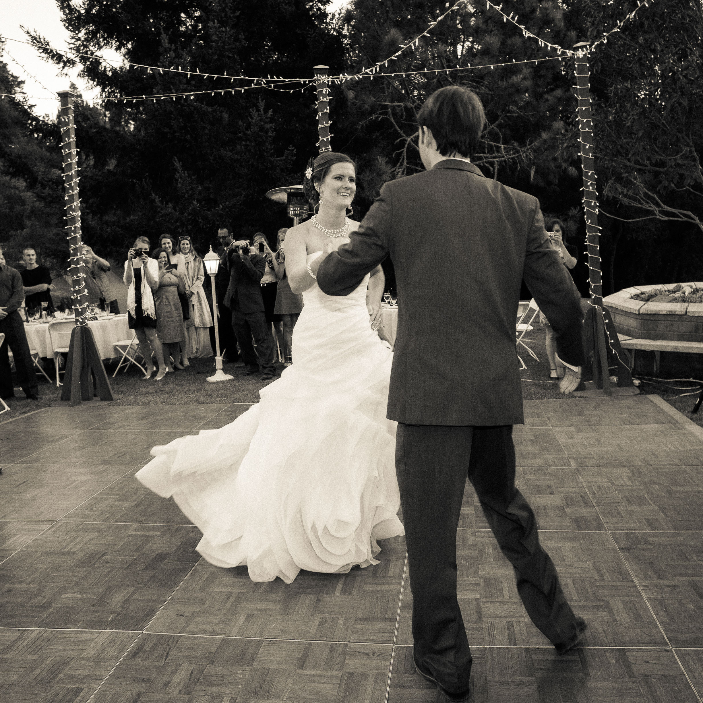 A couple's first dance, in elegant black and white, at Pema Osel Ling in the Santa Cruz mountains