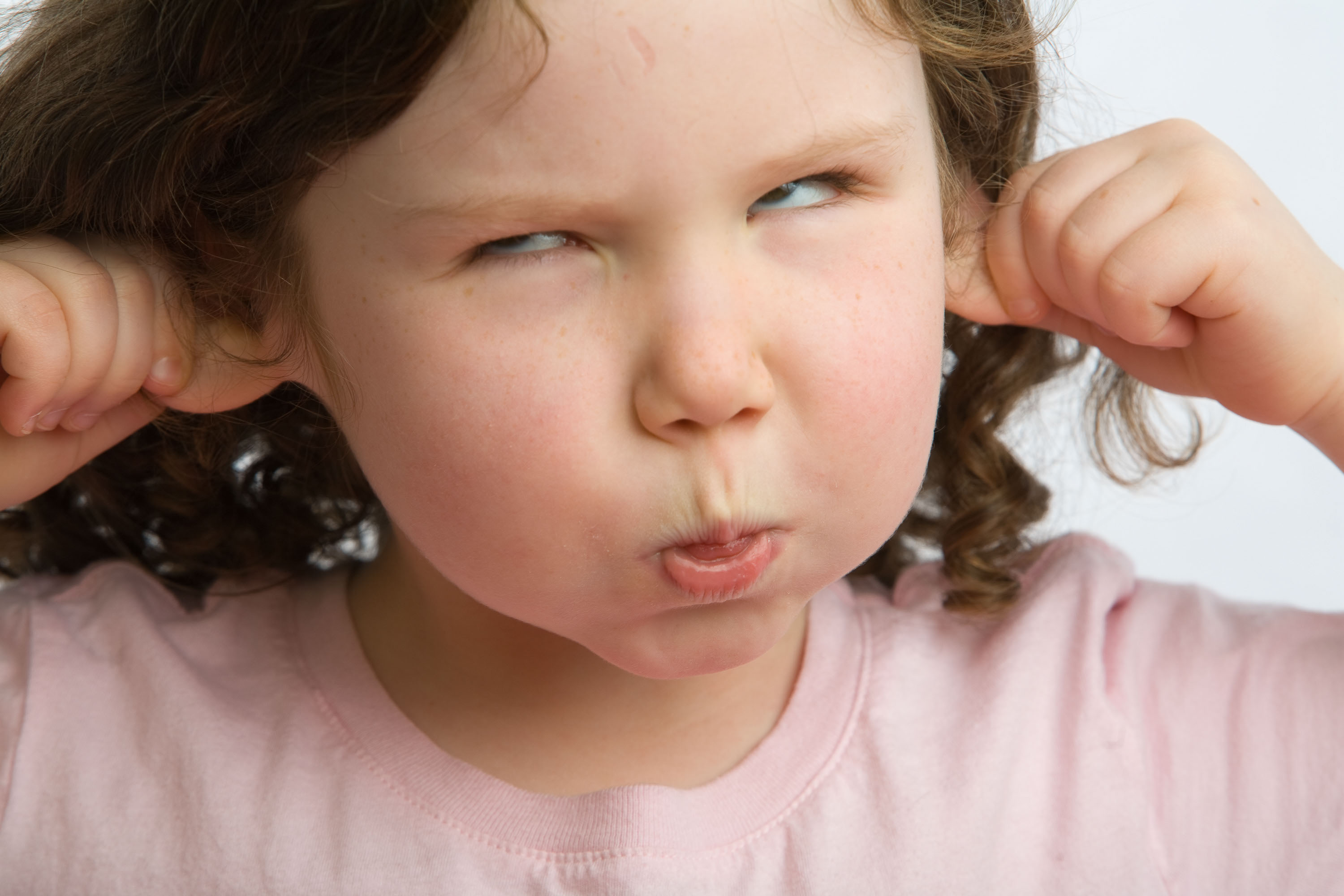 A 4-year-old girl makes the funniest face in the world