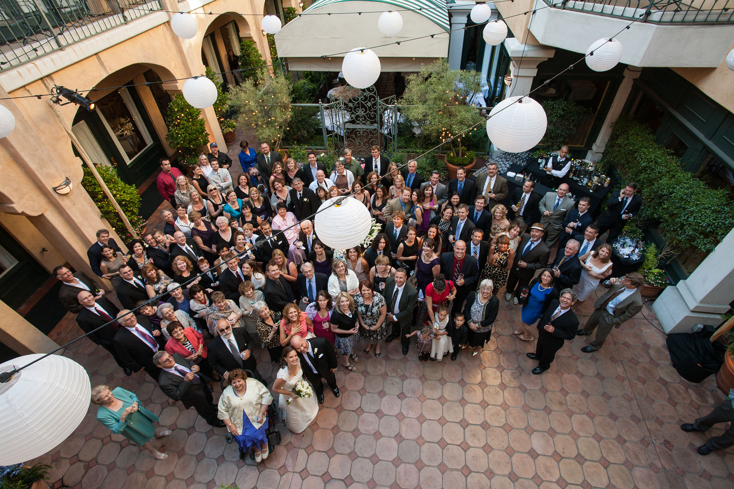 The entire wedding party photographed from a balcony of the Garden Court Hotel in Palo Alto