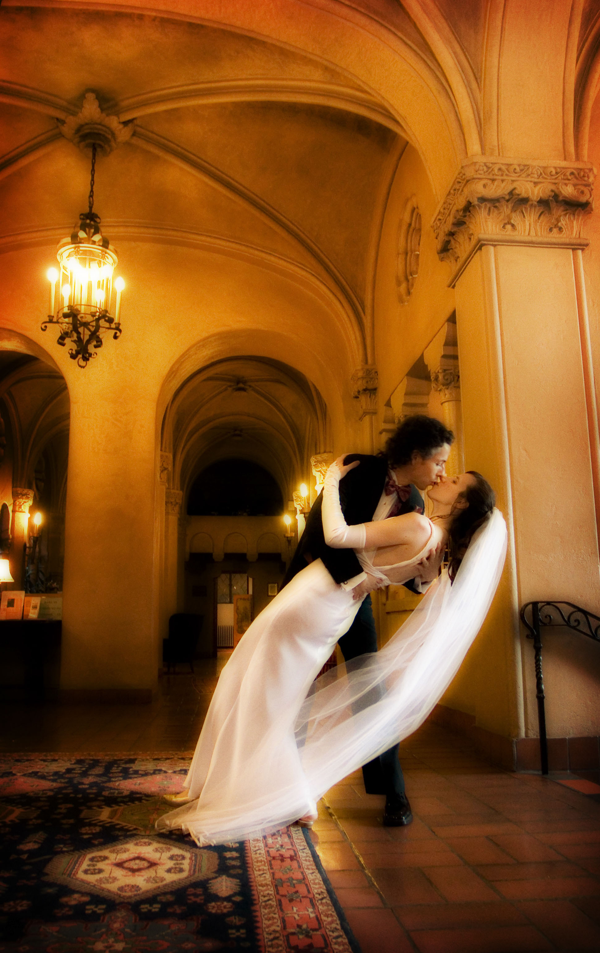 A beautiful couple in a dramatic dip at the Berkeley City Club on their wedding day.