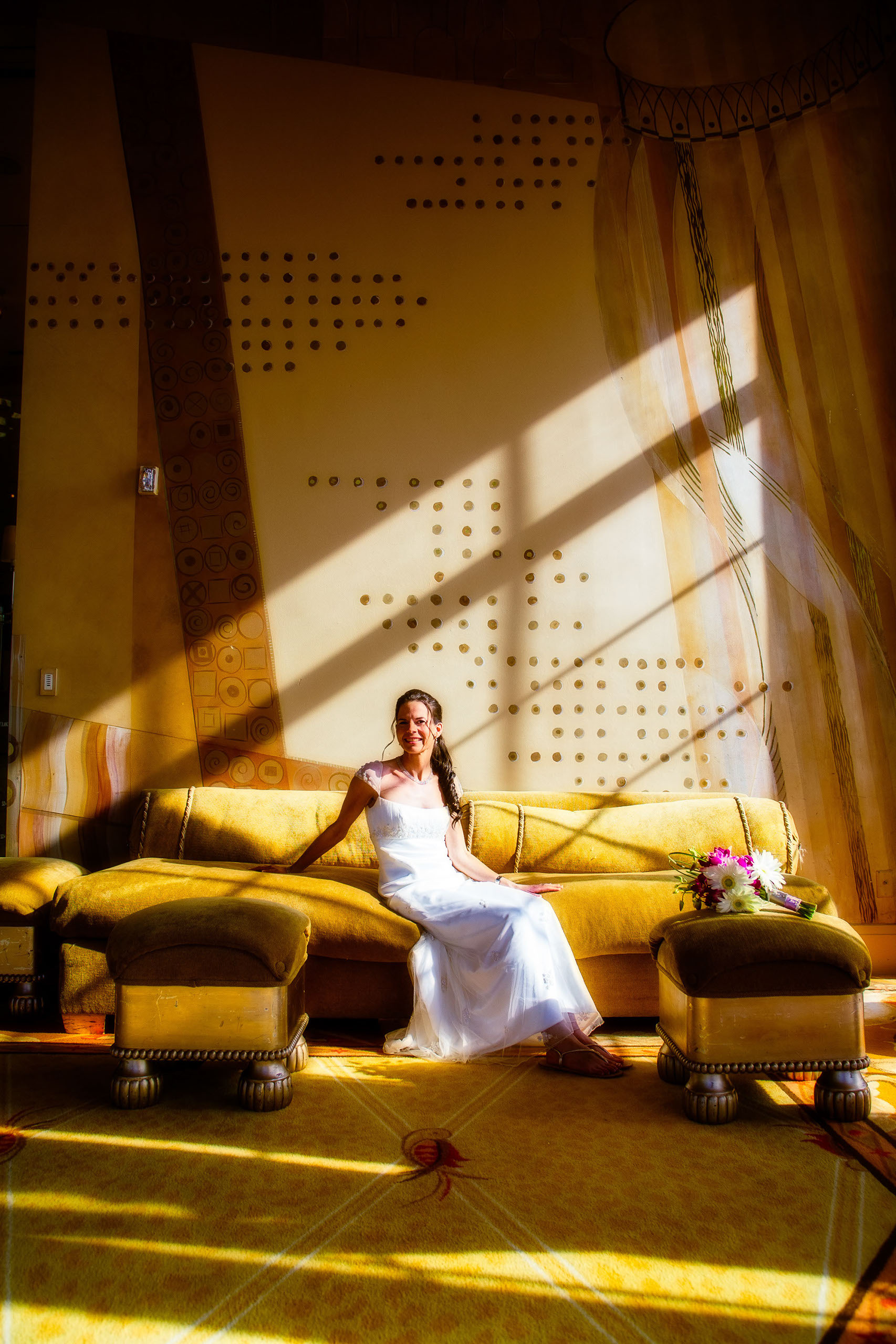 Dramatic bridal portrait in Alexander's Palace at the St. Francis in San Francisco. The bride is wearing Augusta Jones.