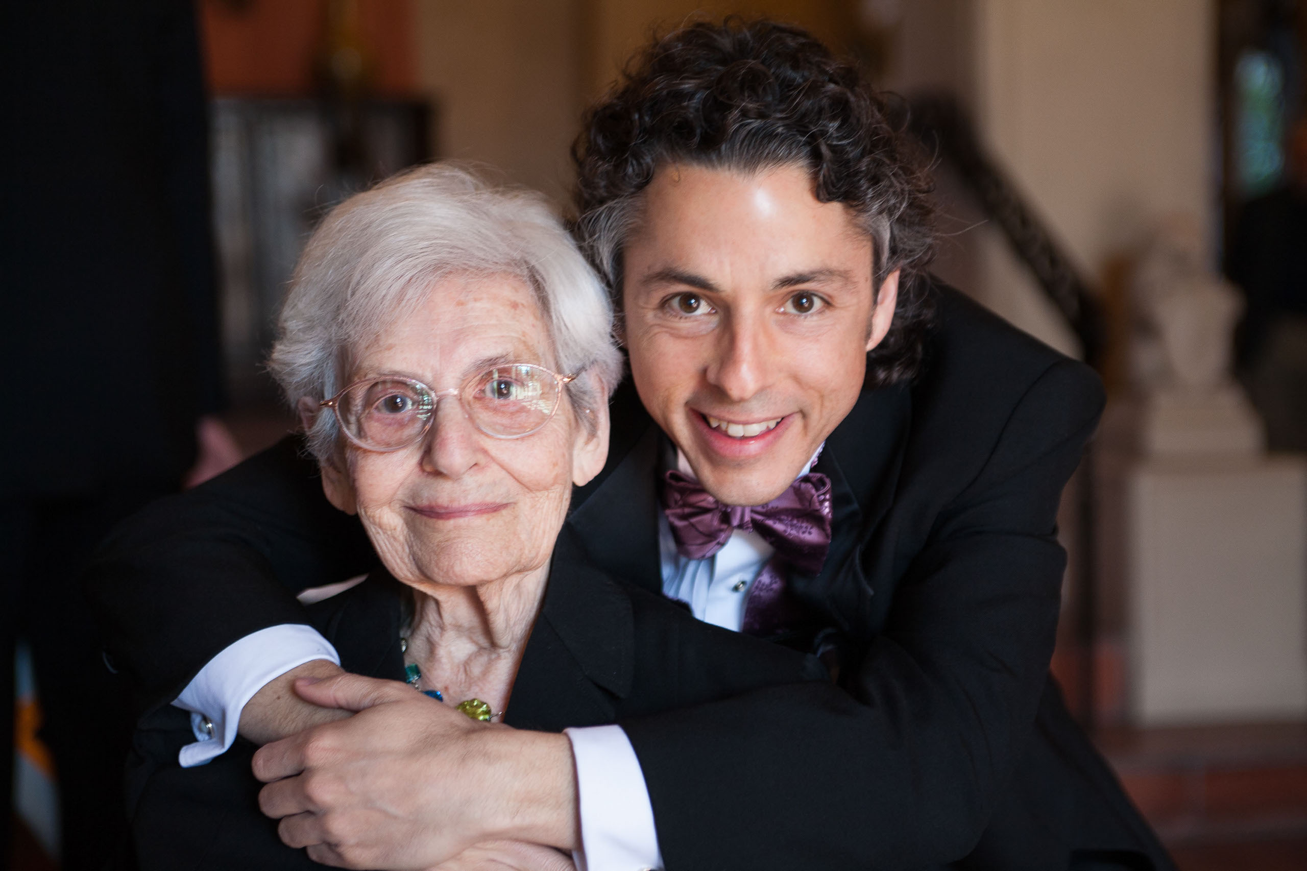 The groom hugs his grandmother at his wedding at the Berkeley City Club