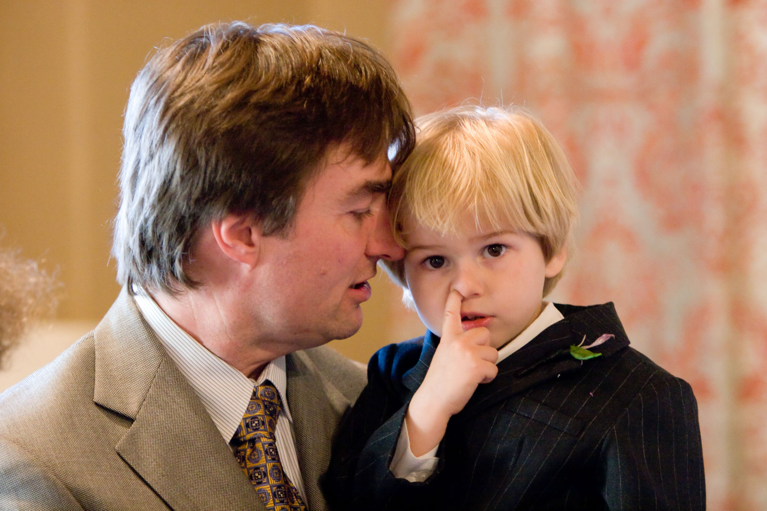 A young wedding guest takes care of business at the Berkeley City Club