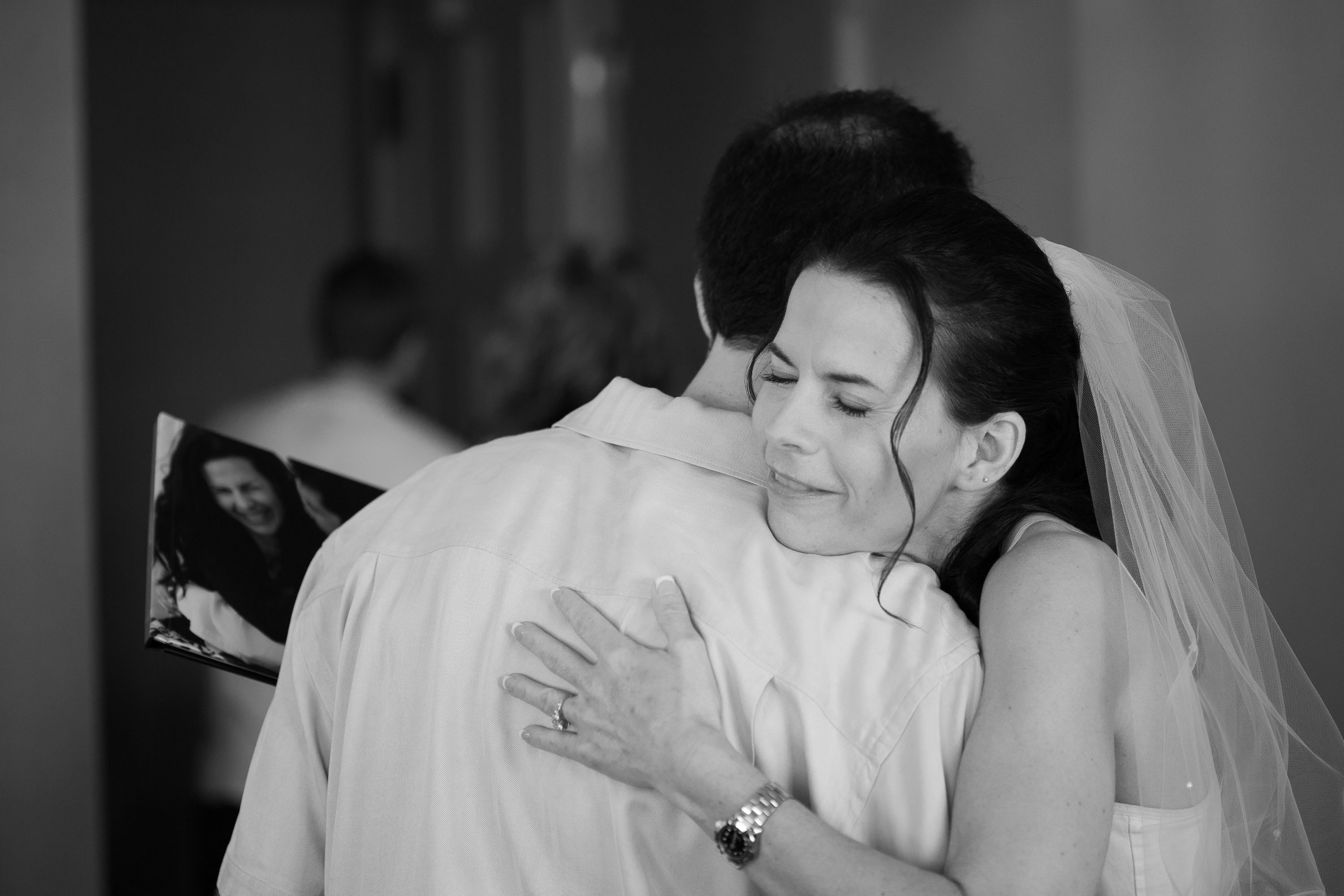 The bride hugs her brother at the St. Francis Hotel in San Francisco