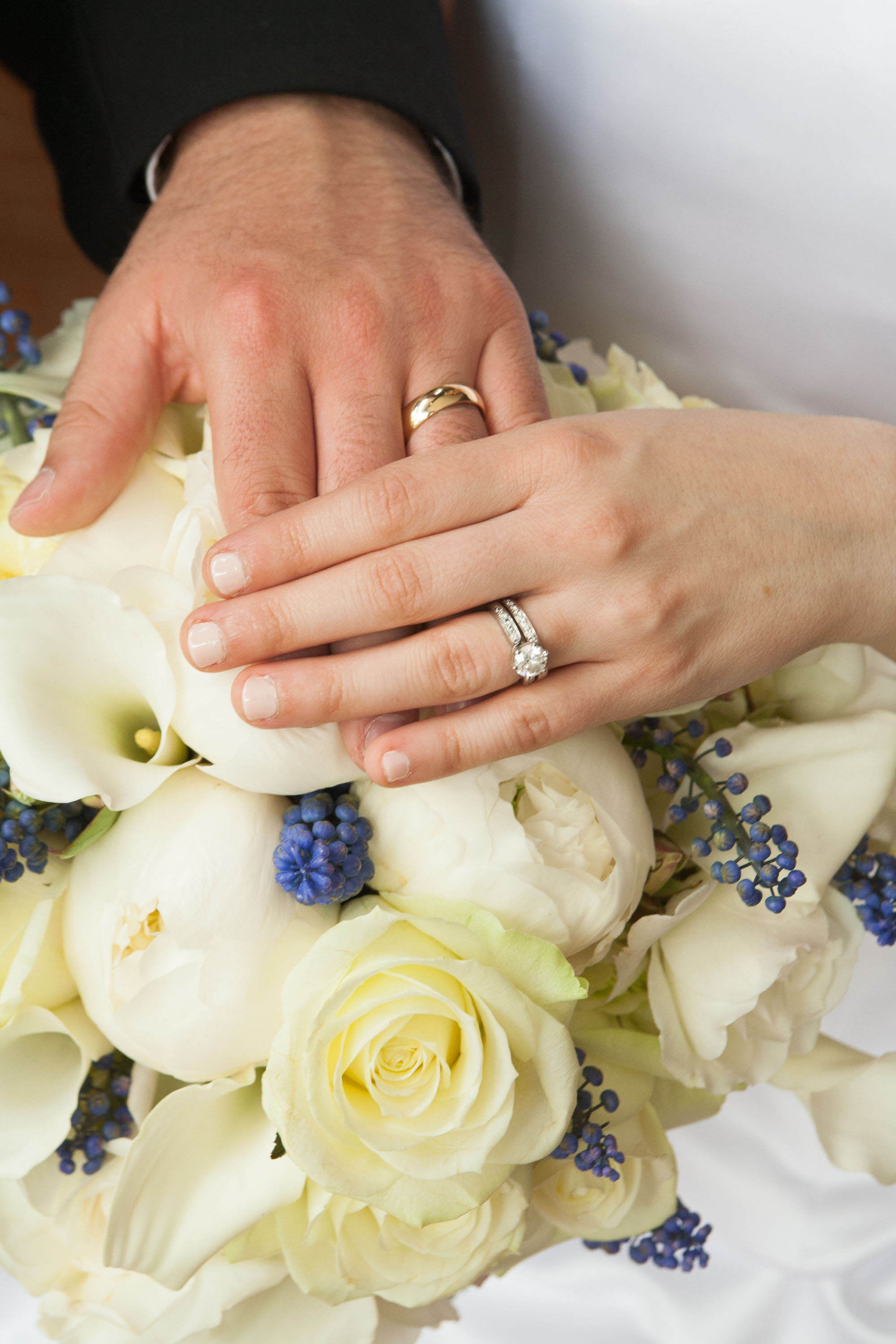 Bridal flowers and wedding rings at St. Mary's Cathedral in San Francisco.
