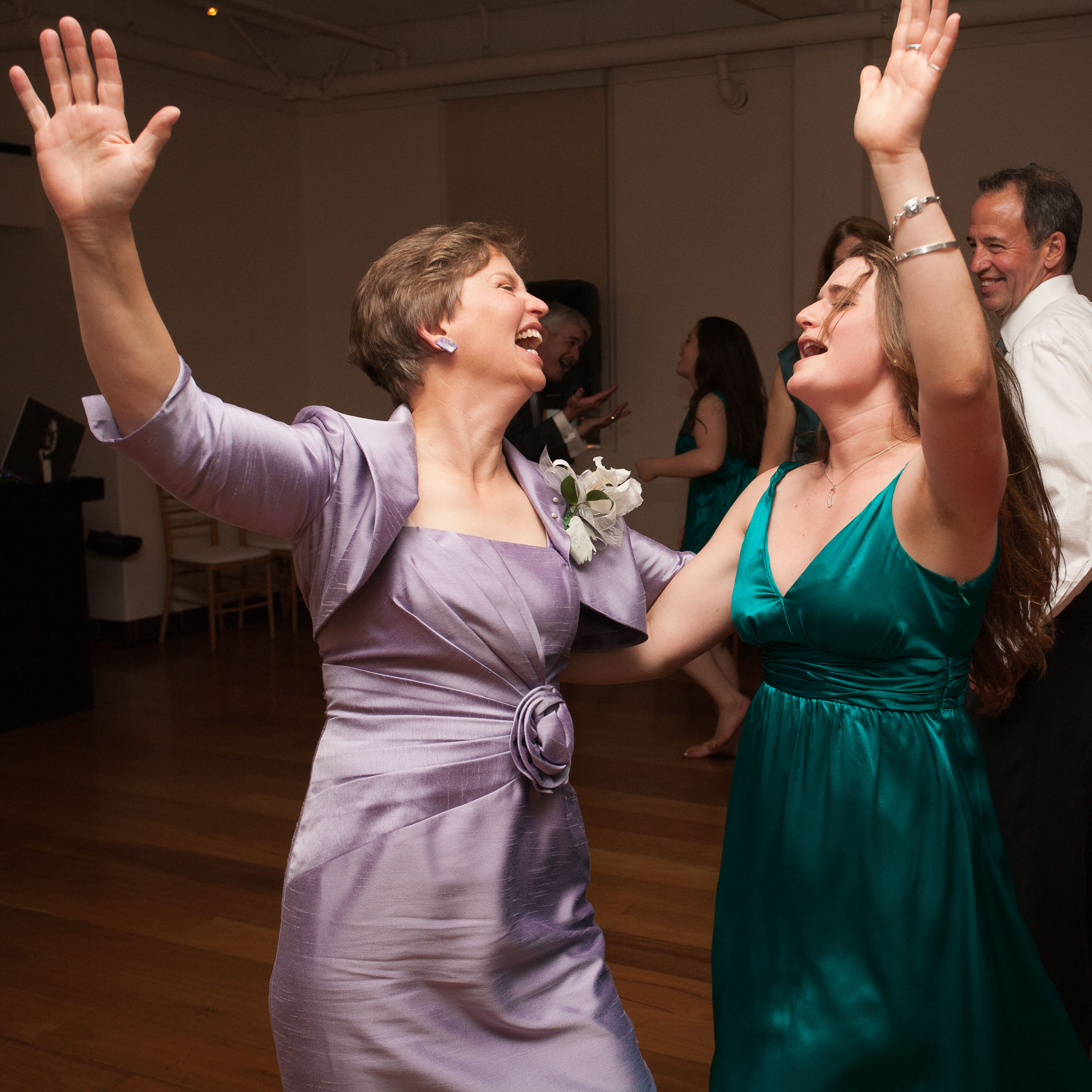 The mother of the bride and the maid of honor get down